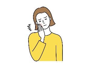 歯が痛む女性