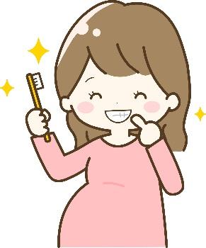 口腔ケアをする妊娠中の女性